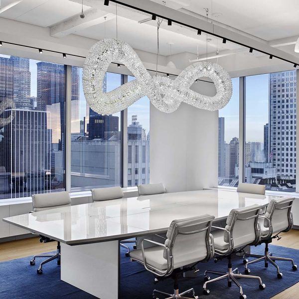 nucraft boat shaped white tavola conference table surrounded by chairs