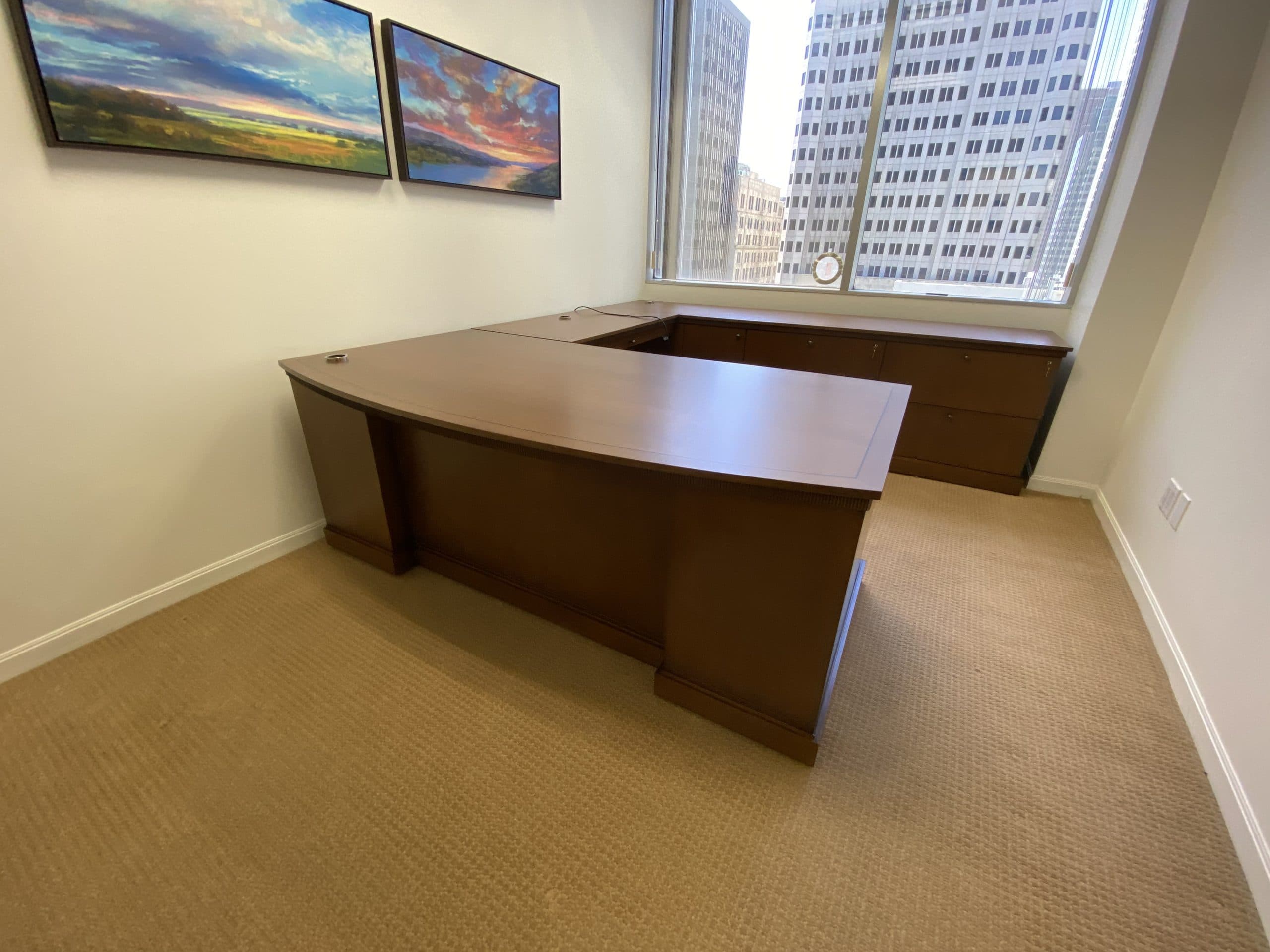 custom desk office furniture inside a private office