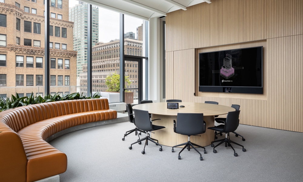 flow-meeting-table-round-dune-veneer-top-dune-veneer-cylinder-base-peloton-hq-van-tassell-photography_md